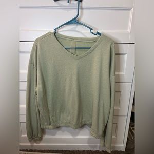 Lightweight green long sleeve cropped top